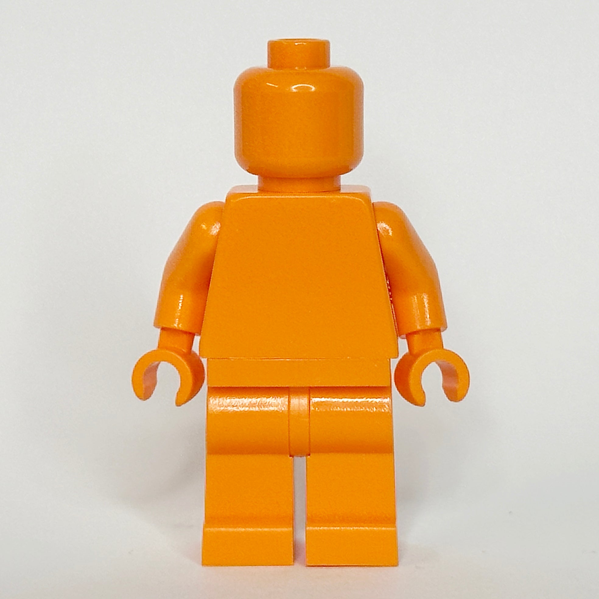 Orange minifigure showing the areas inspected before listing